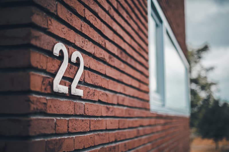 Brick home with sleek address numbers