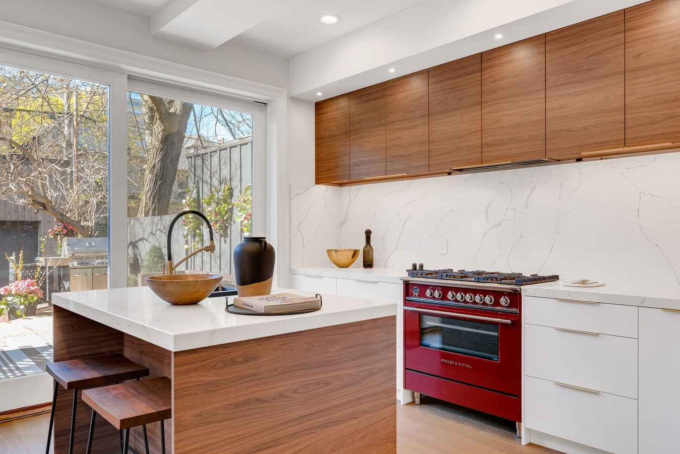 White countertops with a contrasting red cooker