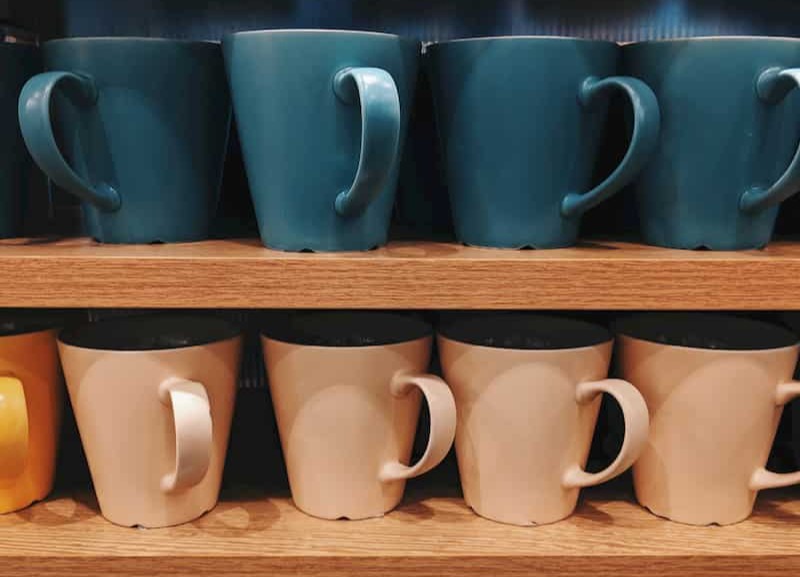 Mugs on kitchen shelves