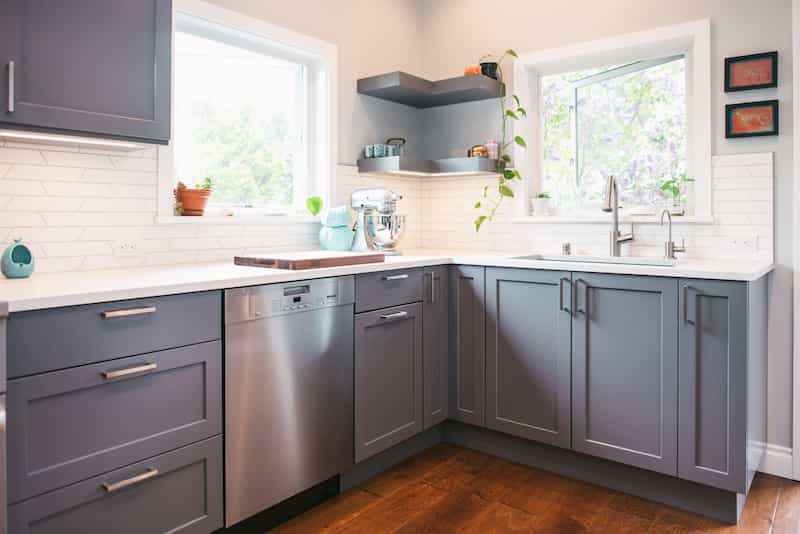 Durable grey painted cabinets in remodeled Seattle kitchen