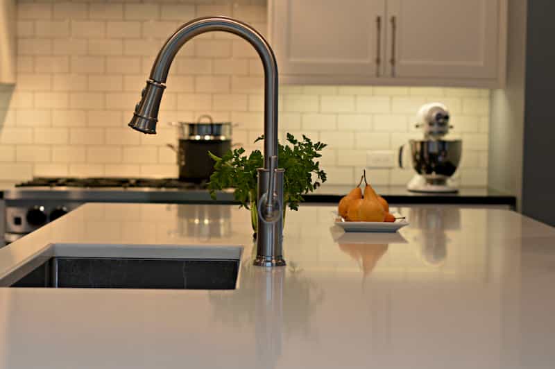 Brass faucet in remodeled Seattle kitchen