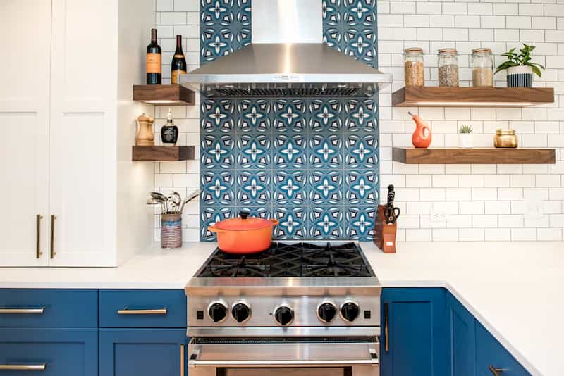 Remodeled Seattle kitchen with cement tile and professional-style range