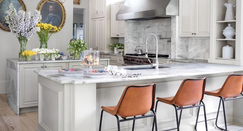A kitchen peninsula extends the kitchen cabinetry