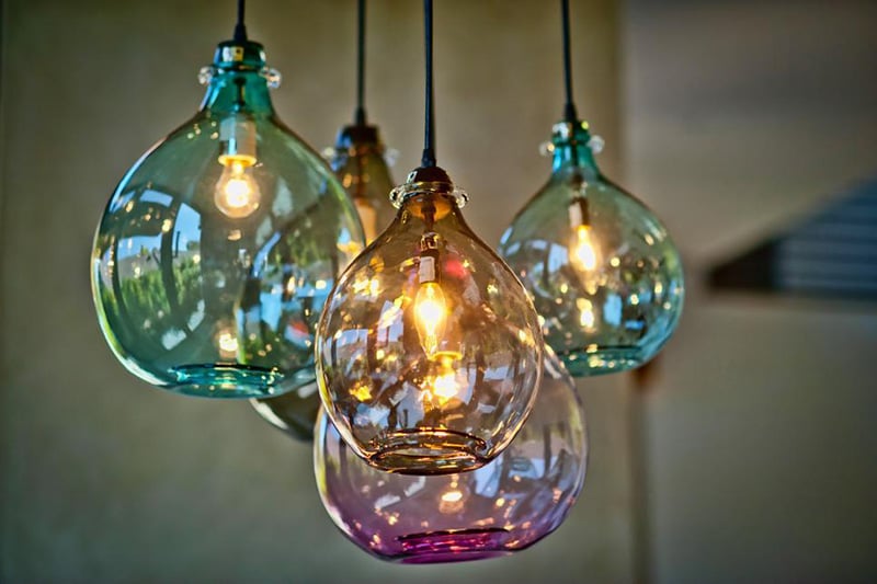 Why not use whimsical multi-colored glass lights to brighten up your peninsula?
