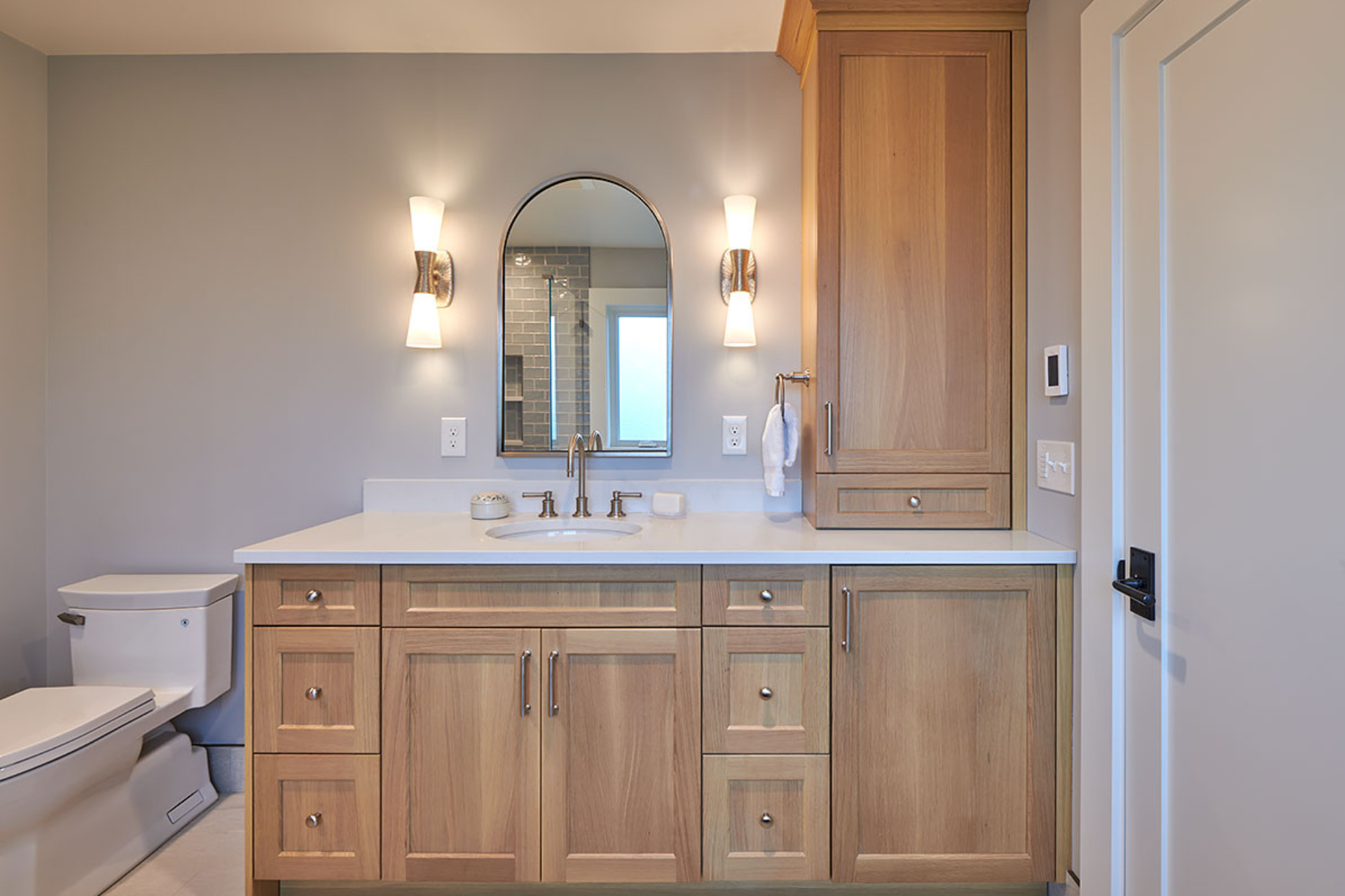 Not sure which bathroom vanity lights are right for your remodel? One of our designers shares expert tips on placement, sizing, brightness and style!