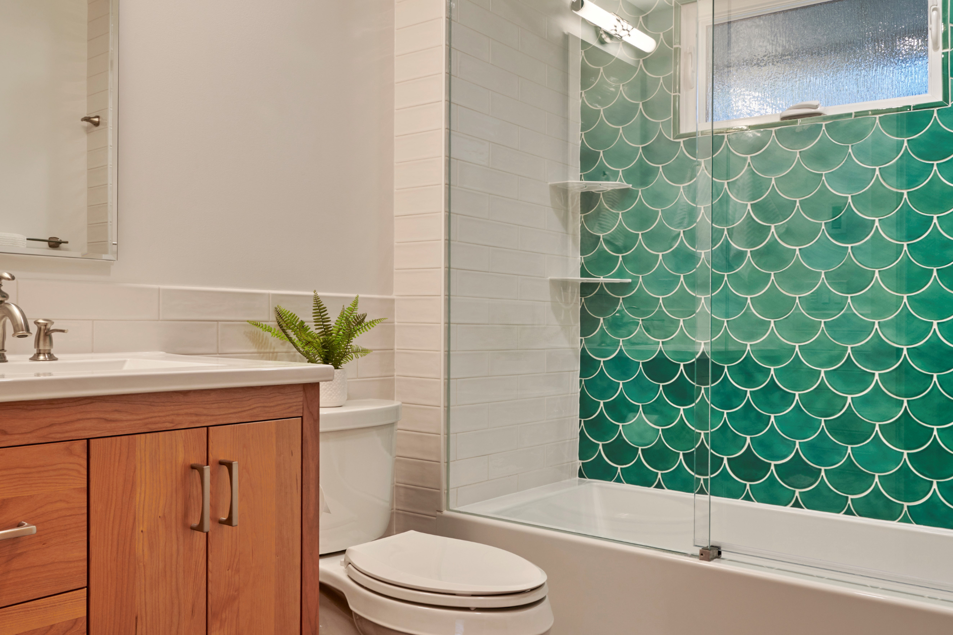 Revamp your bathroom with any of these stunning tile designs! Check out our designer-approved bath tile ideas that will elevate your space and inspire your next renovation.