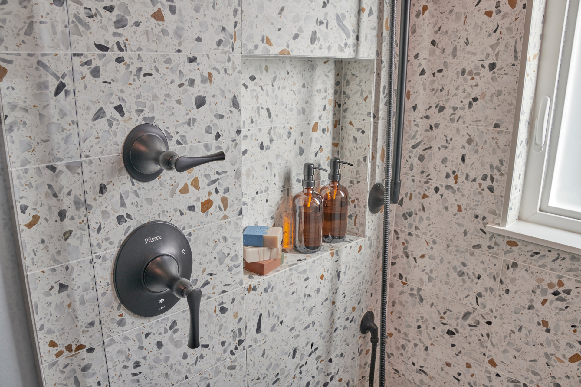 Revamp your bathroom with any of these stunning tile designs! Check out our designer-approved bath tile ideas that will elevate your space and inspire your next renovation.