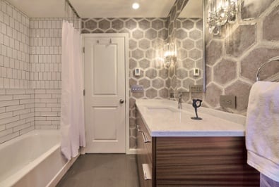 Photo of a guest bath that shares a wall with a masterbath