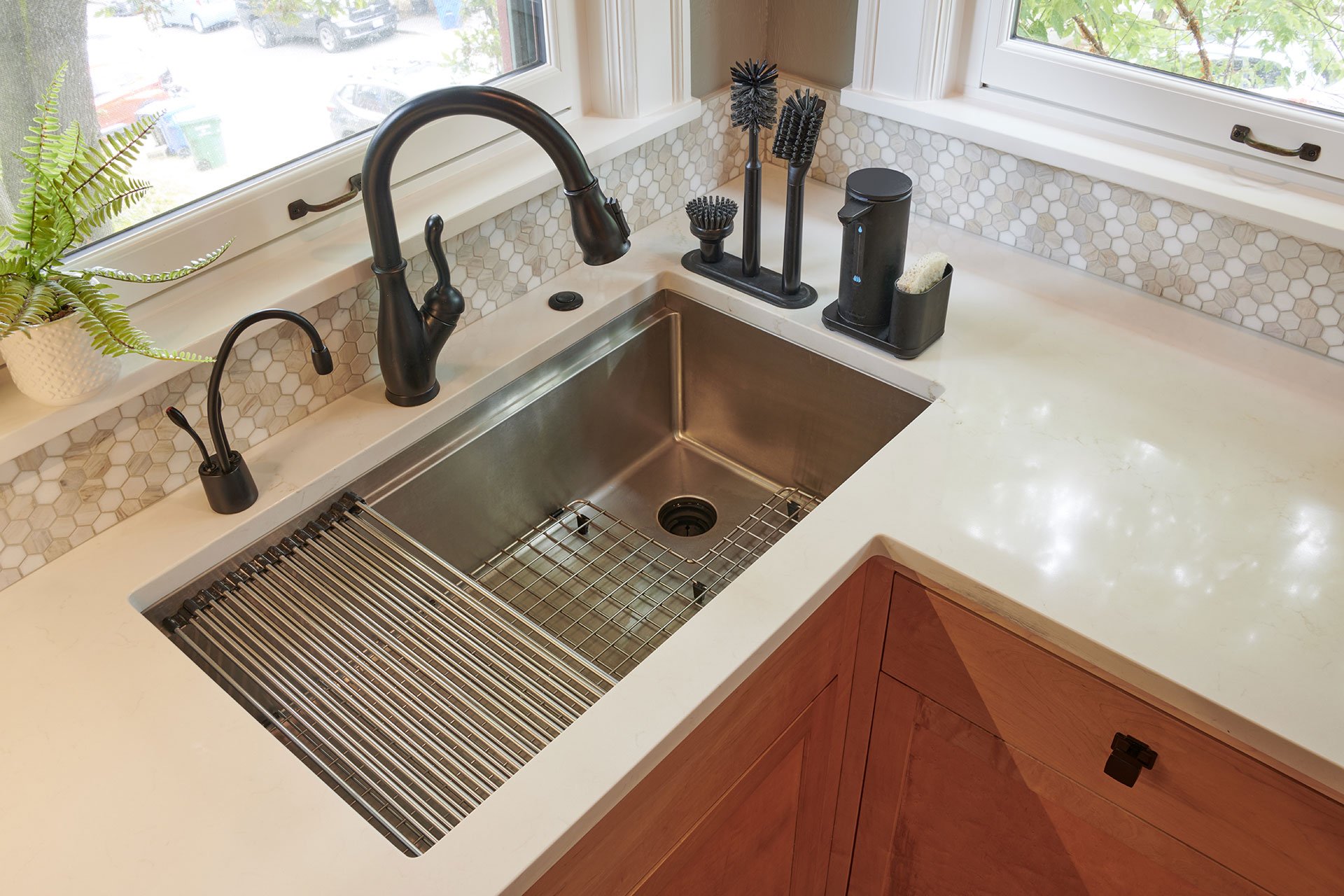 Debating between granite or quartz countertops? Explore the pros and cons of each material and learn how to choose the best option for your Seattle kitchen remodel.