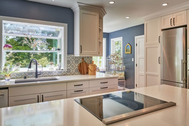 Debating between granite or quartz countertops? Explore the pros and cons of each material and learn how to choose the best option for your Seattle kitchen remodel.