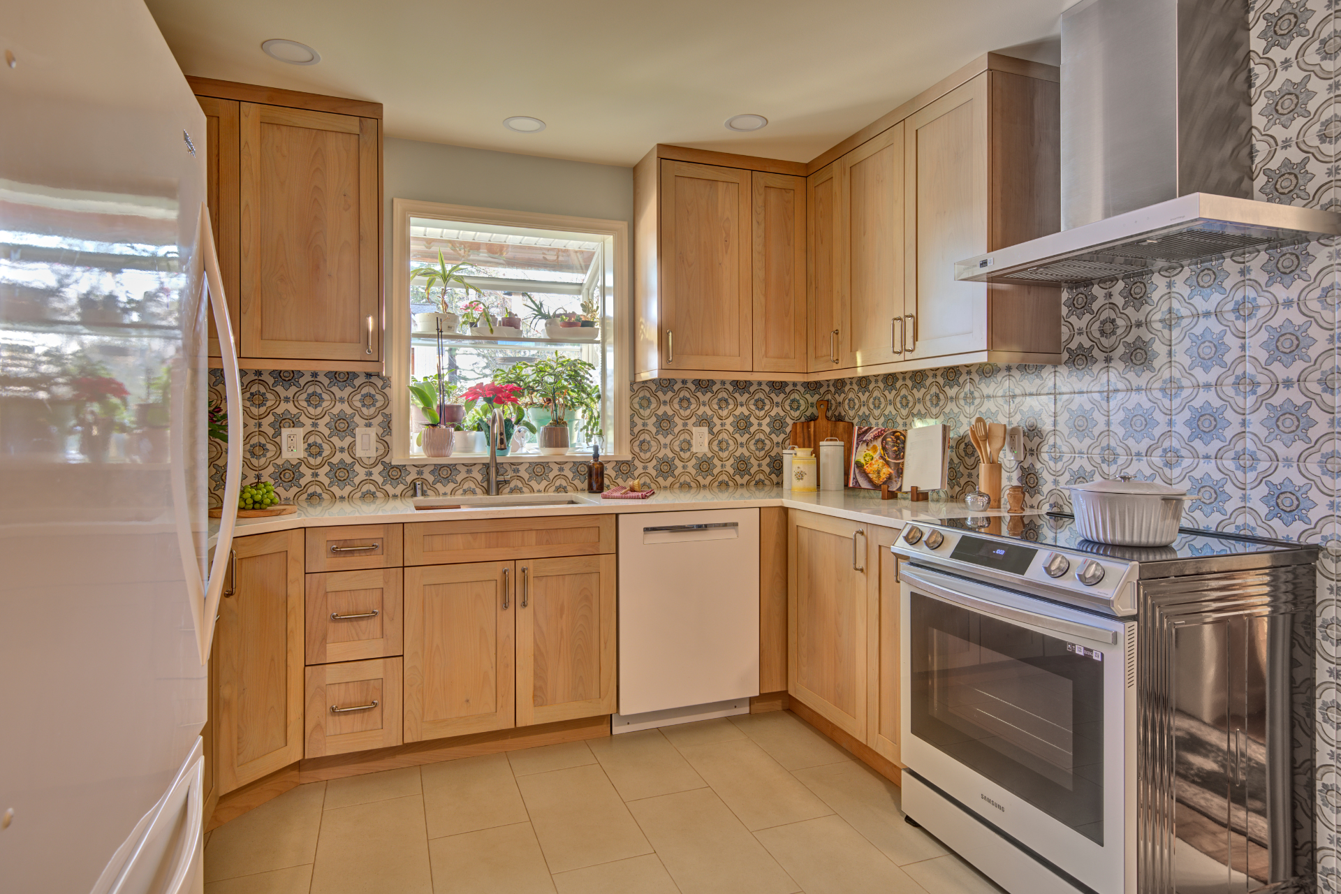 Choosing kitchen floor tiles for your remodel? Learn about durability, material options, style trends and get our expert design tips!