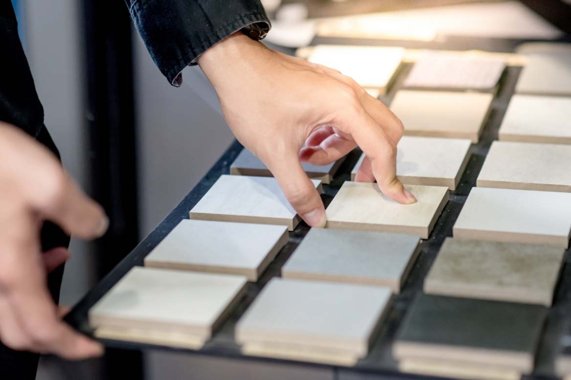 Choosing kitchen floor tiles for your remodel? Learn about durability, material options, style trends and get our expert design tips!