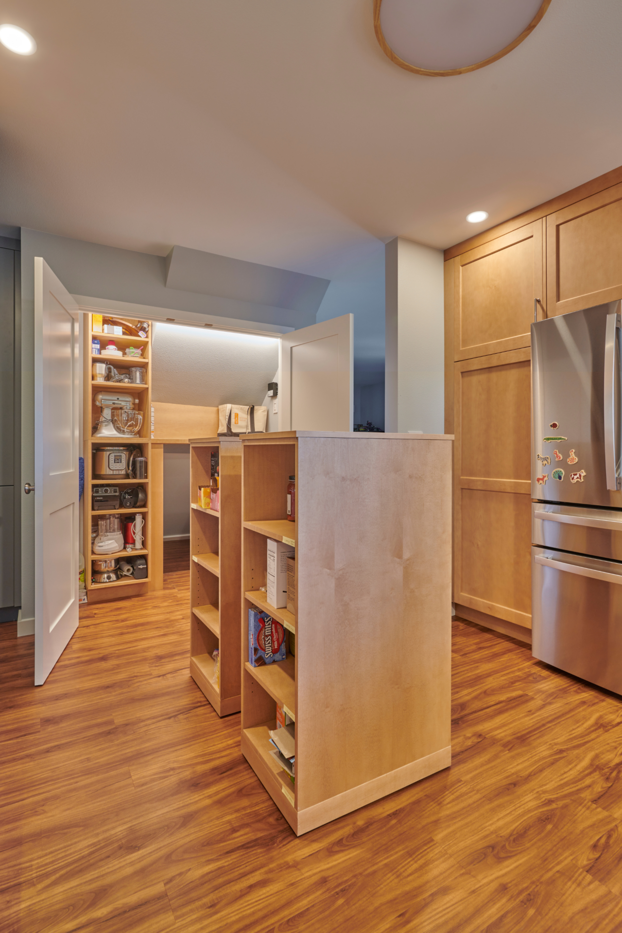 Kitchen Storage Ideas: The Custom Rolling Island Pantry 6 Looking for creative kitchen storage ideas? See how CRD designed a custom rolling island pantry for a Green Lake family — flexible storage that tucks away and rolls out on demand.
