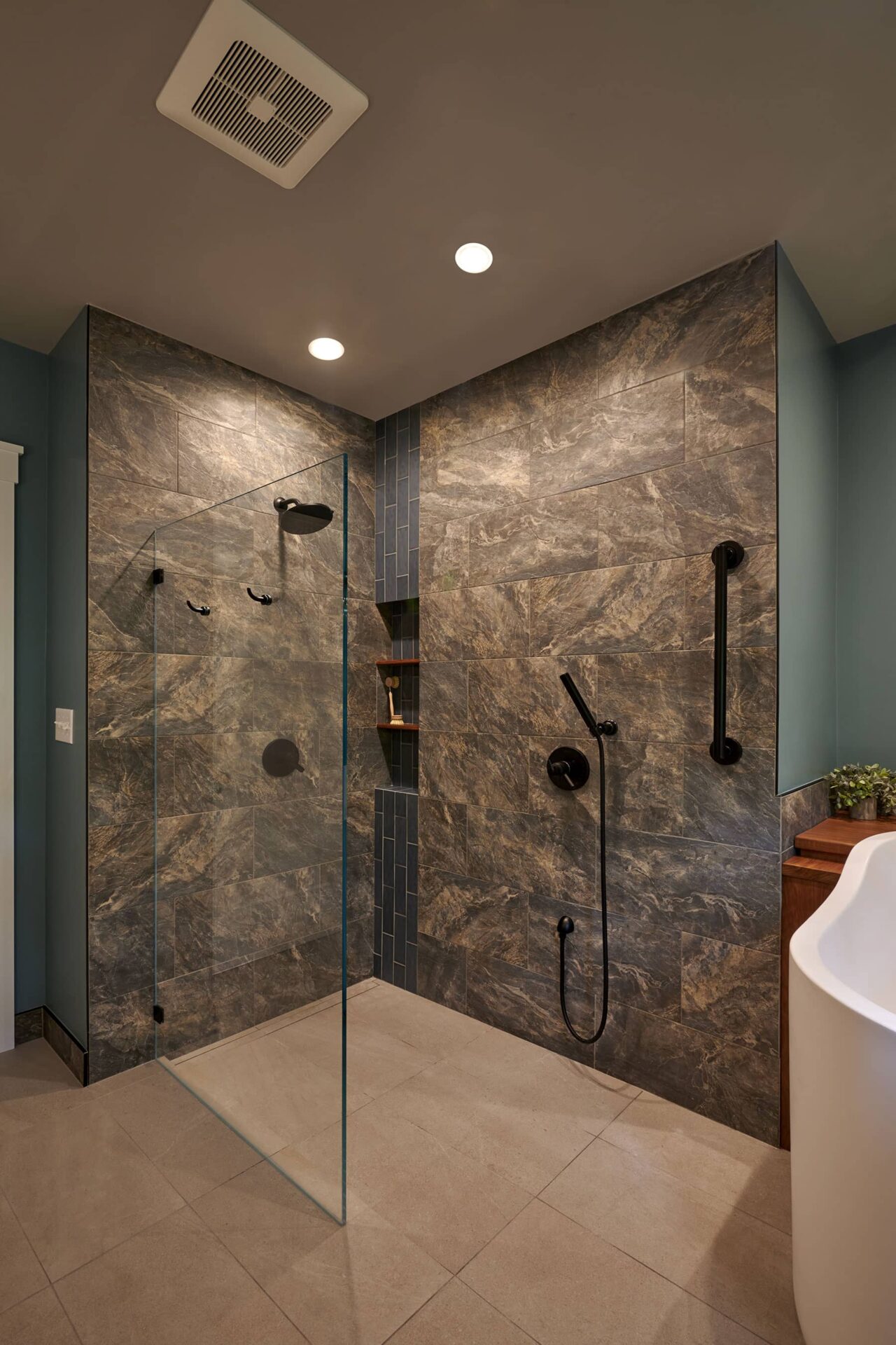 Semi-Curbed bathroom with marble walls  |  curbless and curbed showers